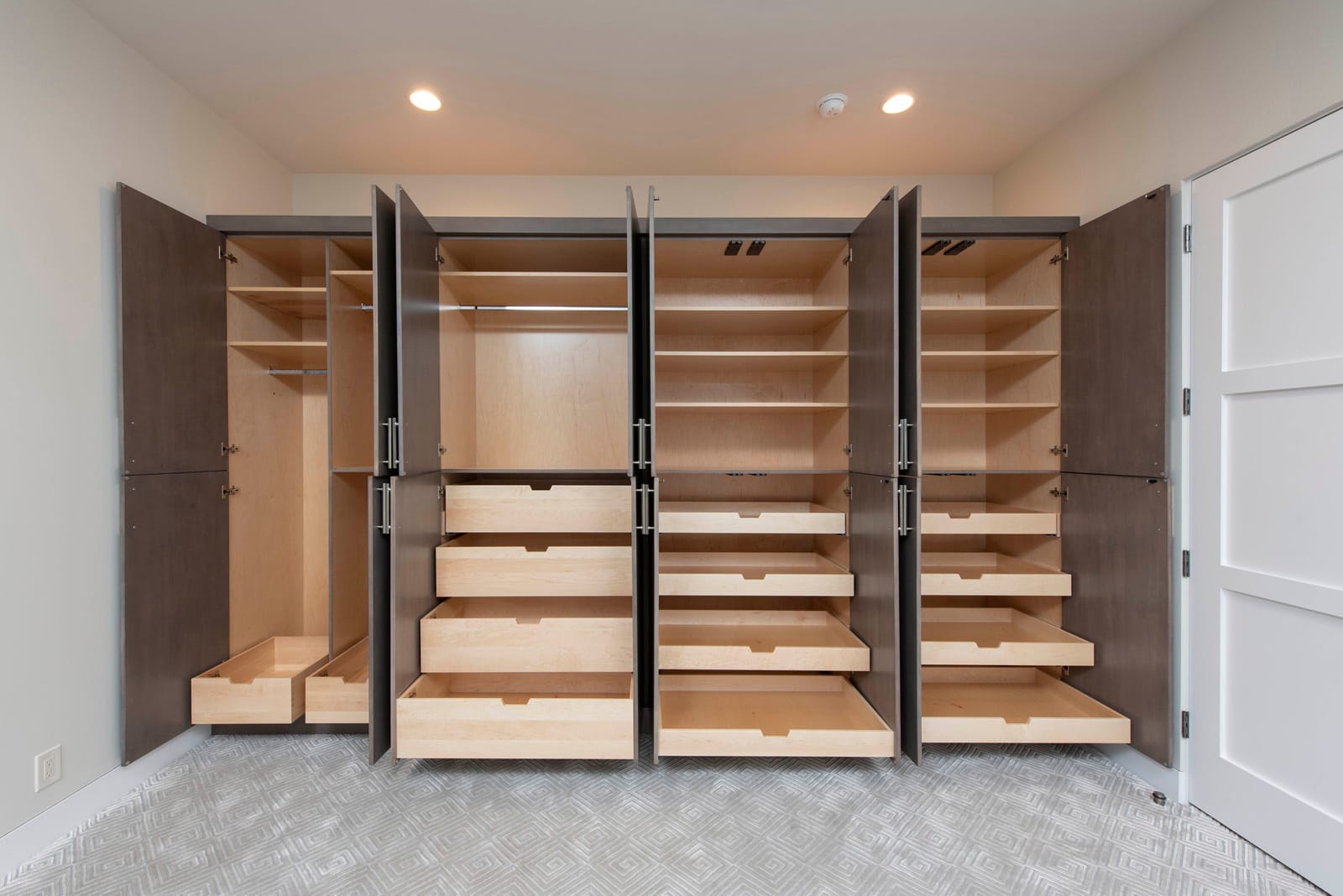 Closet system with roll-out shoe drawers