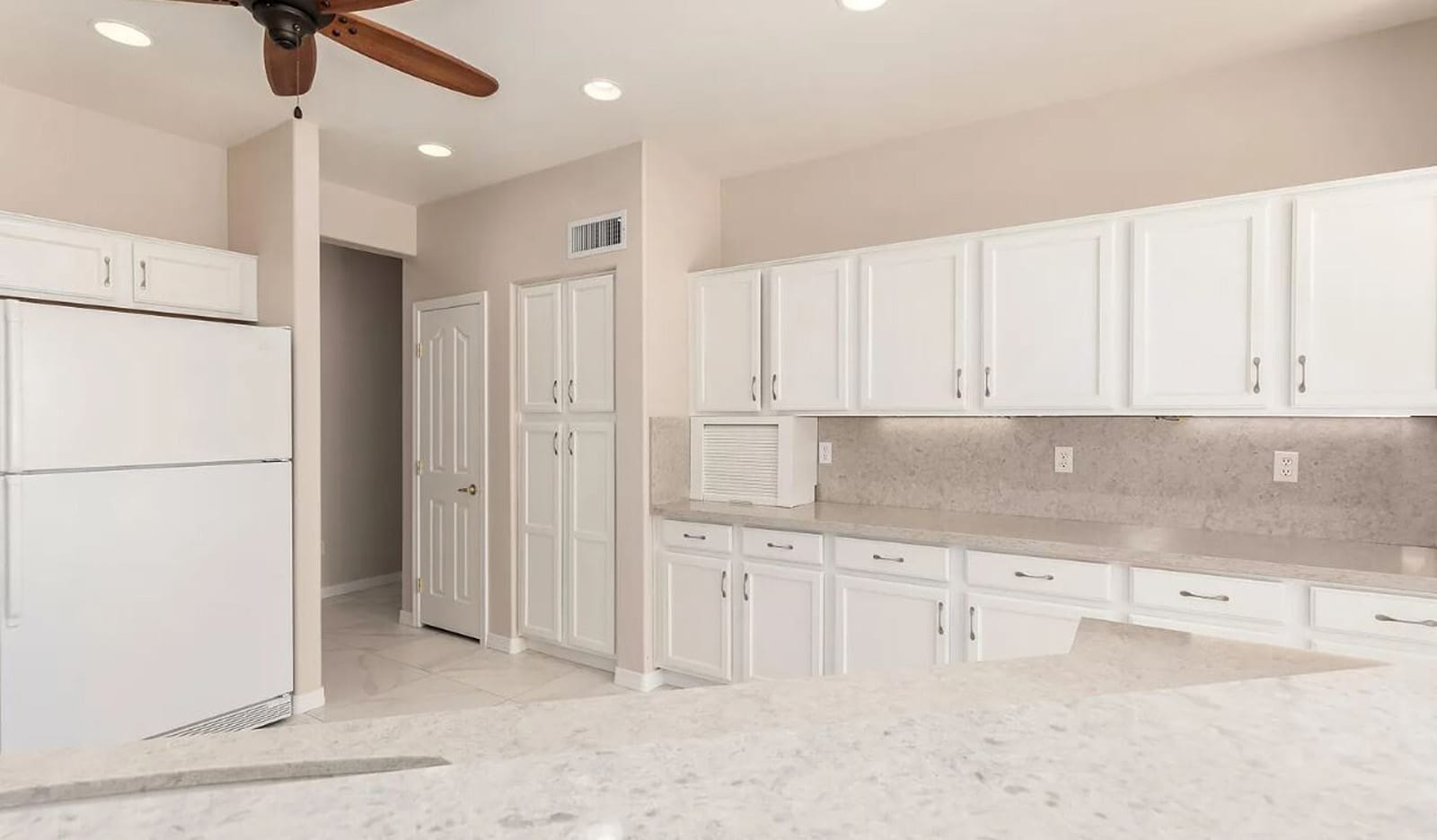 Warm & Functional Chef’s Kitchen in Surprise, AZ, before photo 4