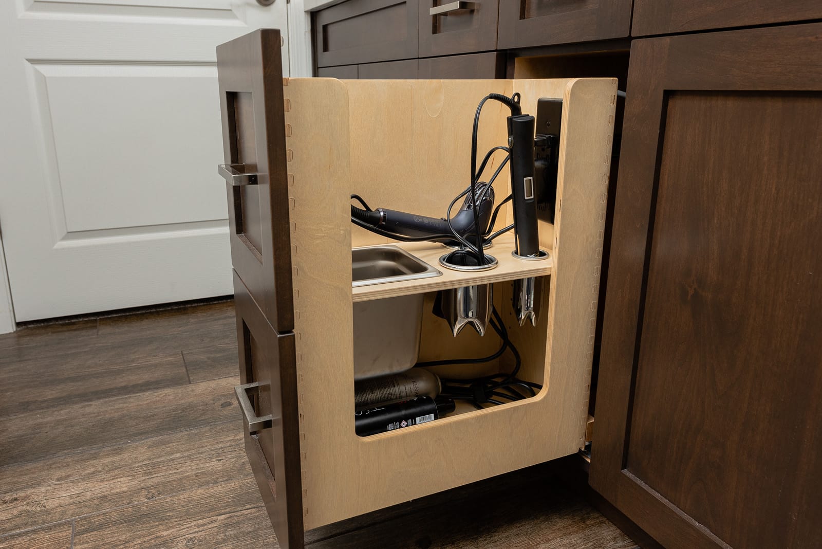 Powered hair-dryer pull-out